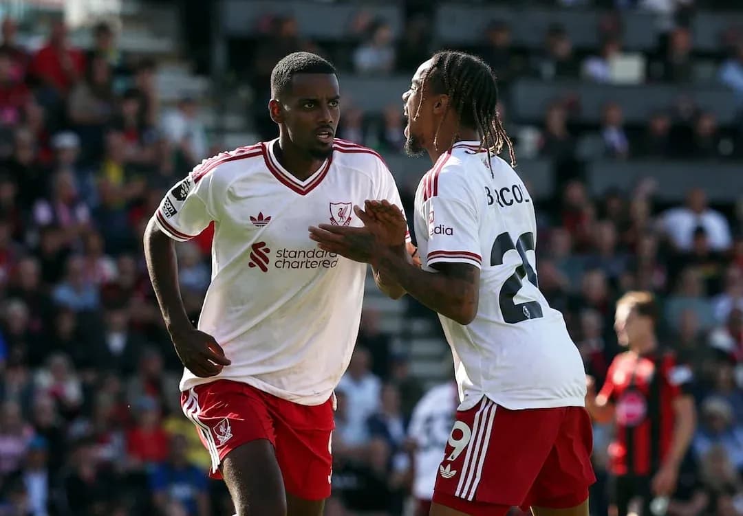Liverpool players celebrating a goal during match