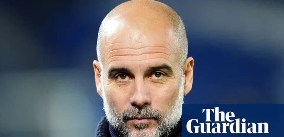 Coach with bald head and beard in stadium