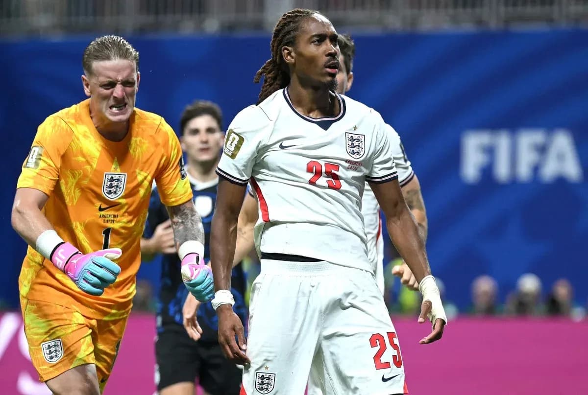England players reacting during a tense moment in match