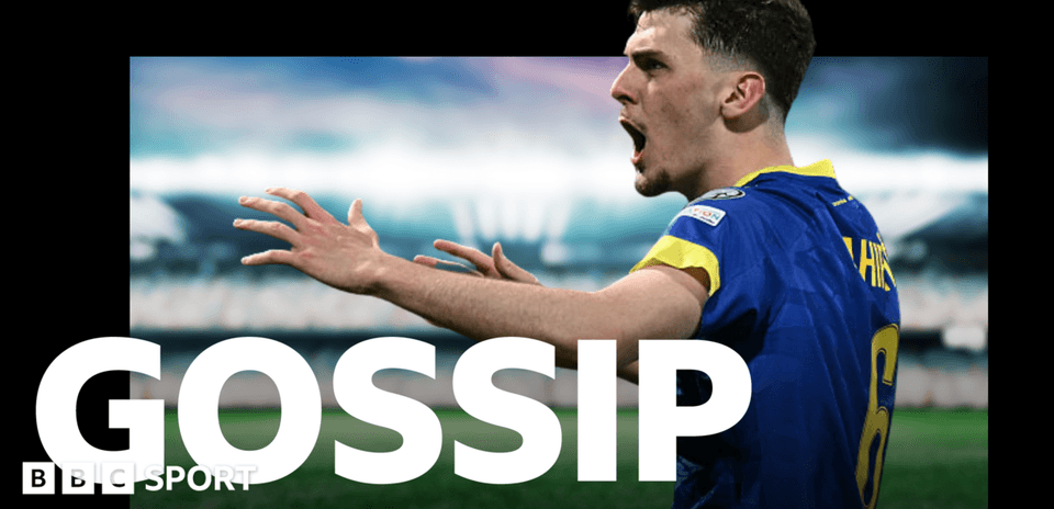 Player celebrating with outstretched arms on pitch