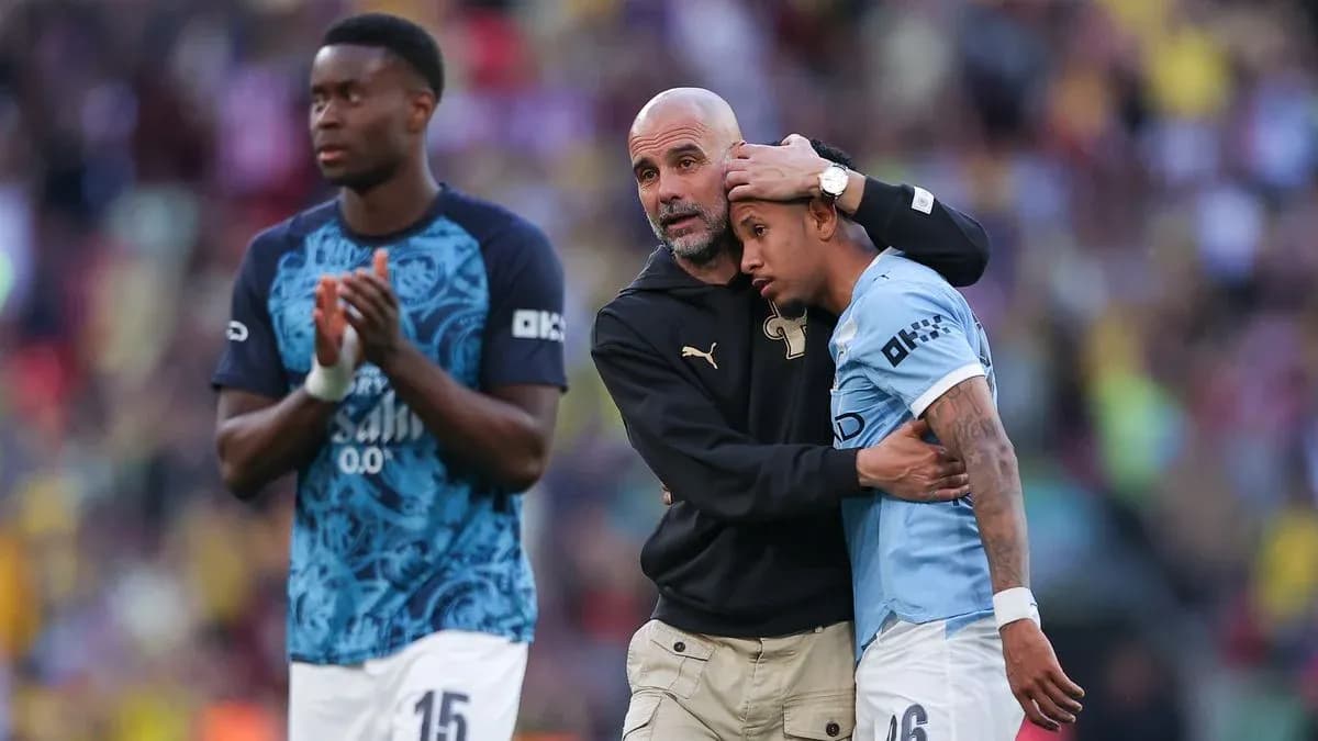 Coach comforting player after the match