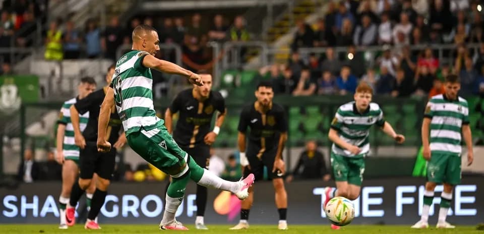 Player taking a penalty kick during match