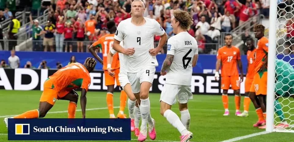 Player celebrating goal with teammates during match