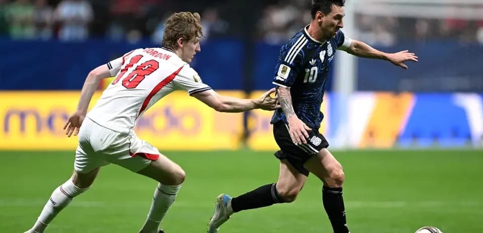 Player dribbling past opponent during soccer match