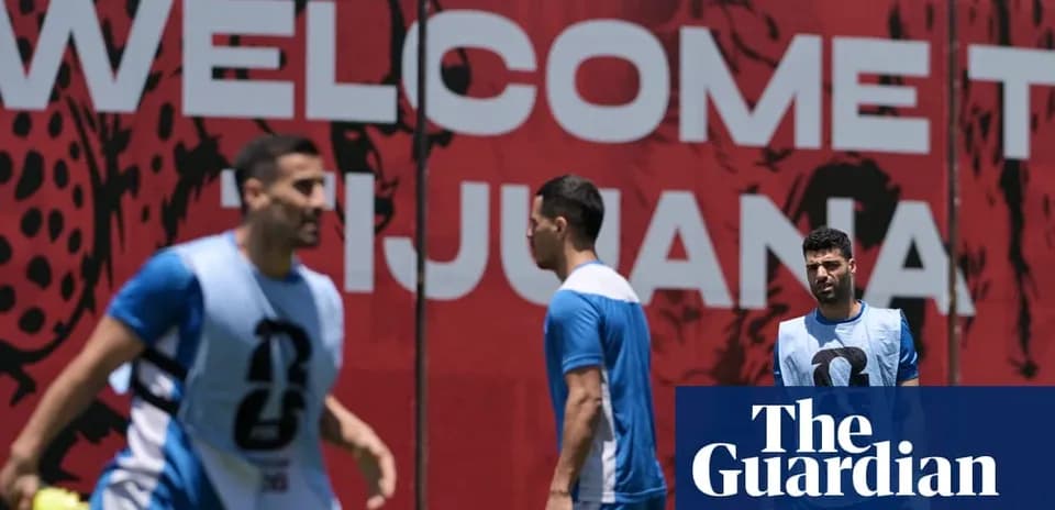 Players training near a welcome sign in Tijuana