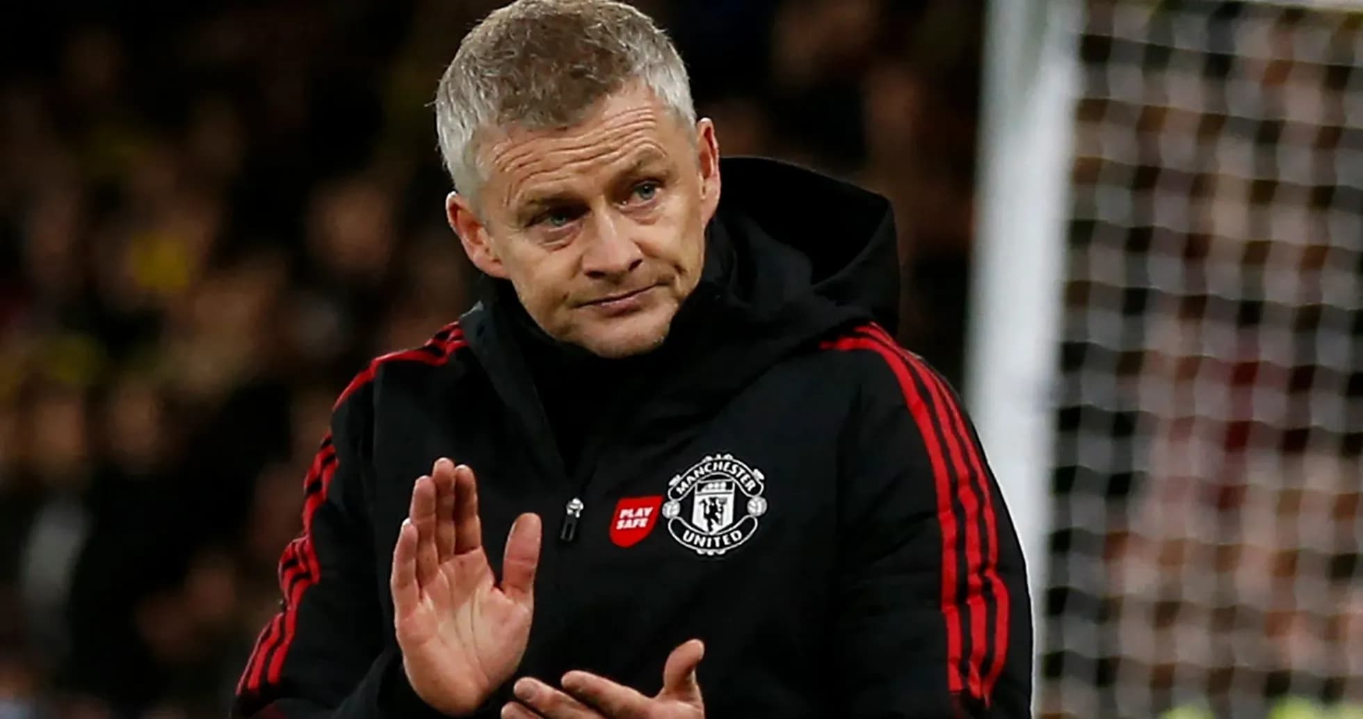 Manager gesturing during match at stadium