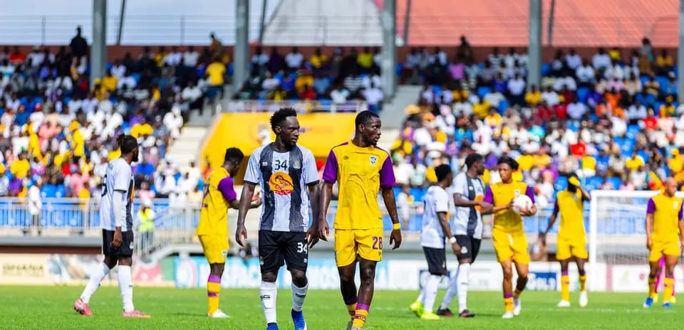 Players on field during TP Mazembe vs Medeama match