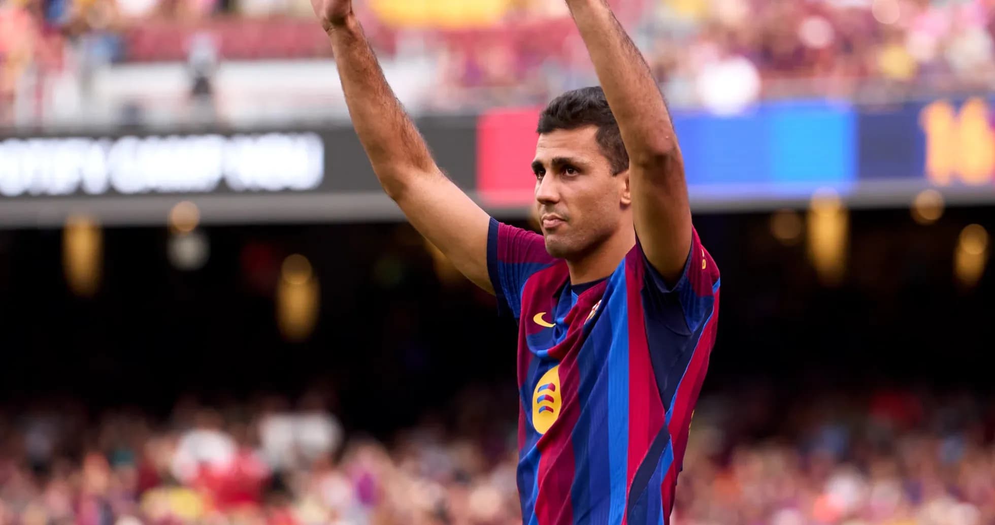 Player acknowledging fans at Camp Nou stadium