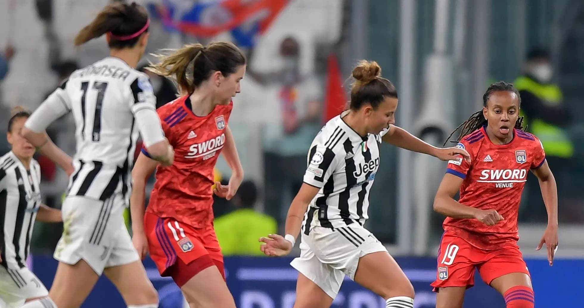 Juventus and Lyon women players in action