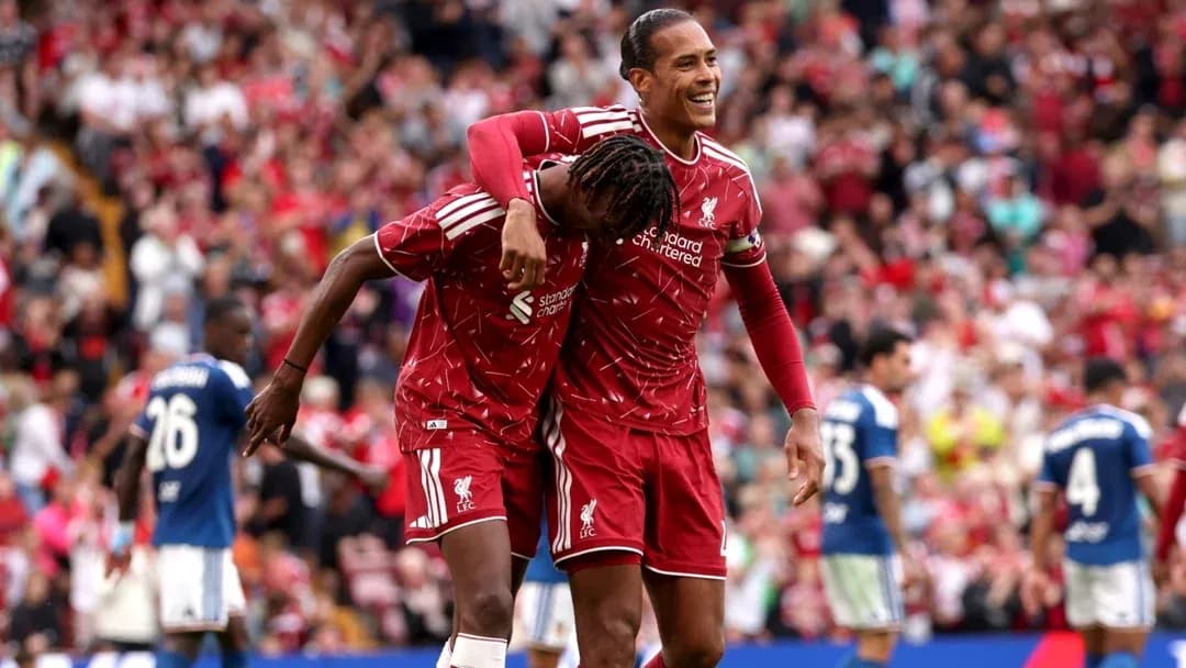 Liverpool players celebrating a goal during match