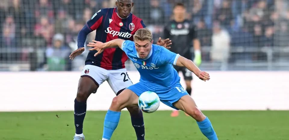 Players contesting for the ball in Serie A match