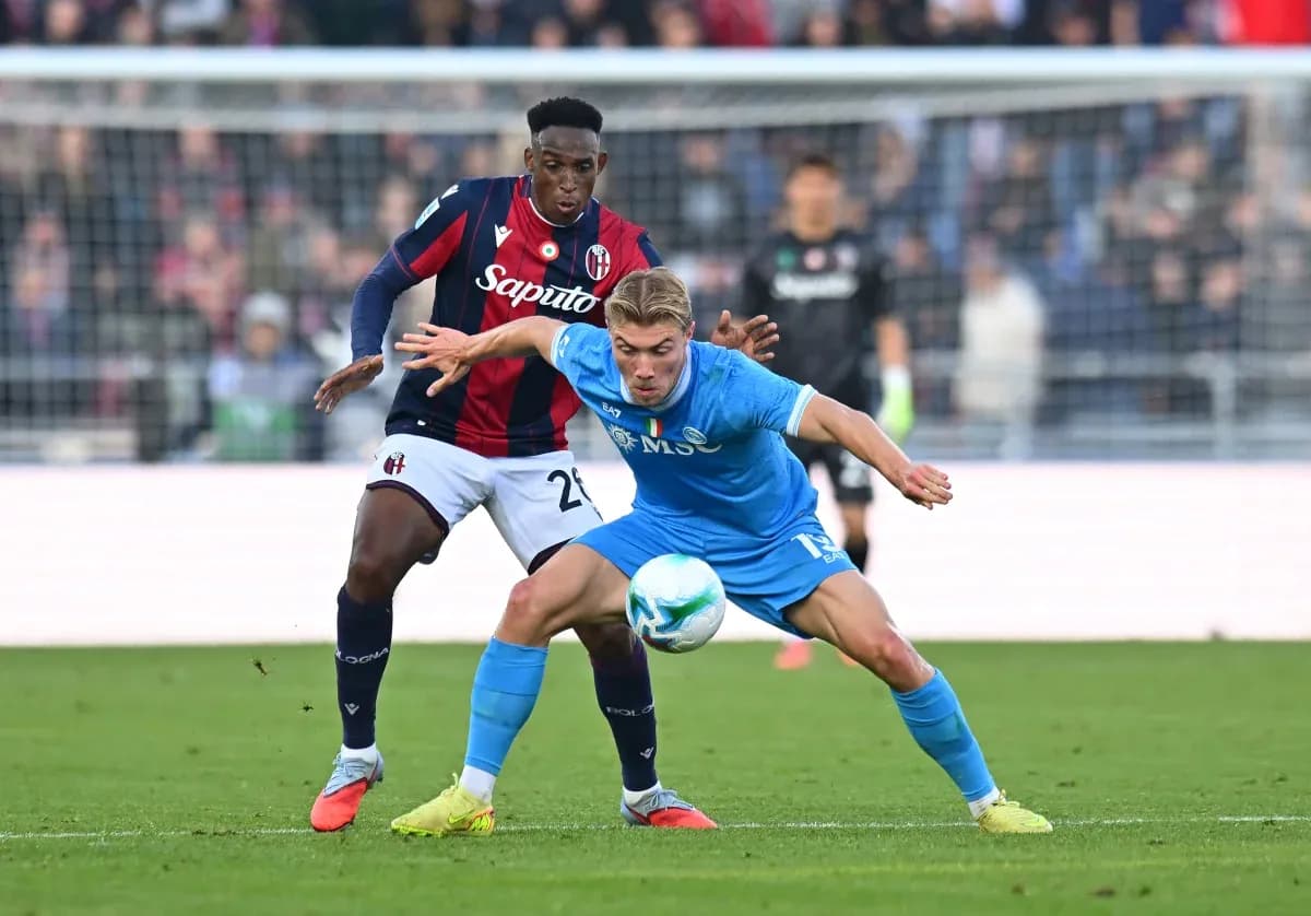 Players contesting for the ball in Serie A match