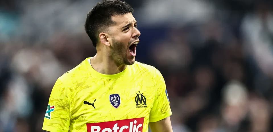 Goalkeeper shouting in bright yellow uniform