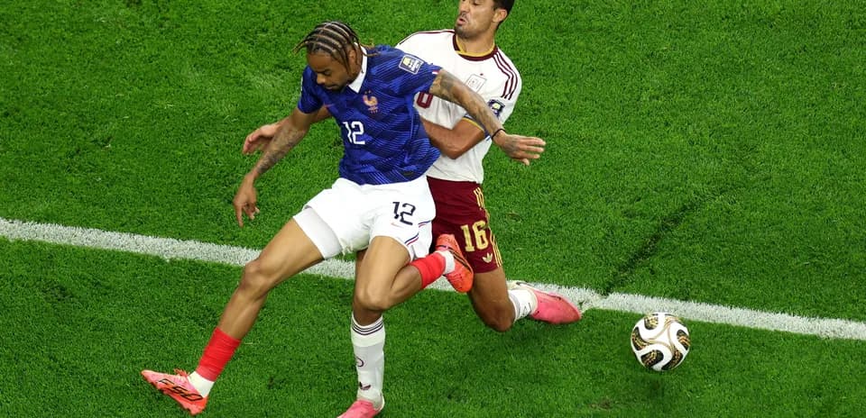 Players battling for the ball during a match