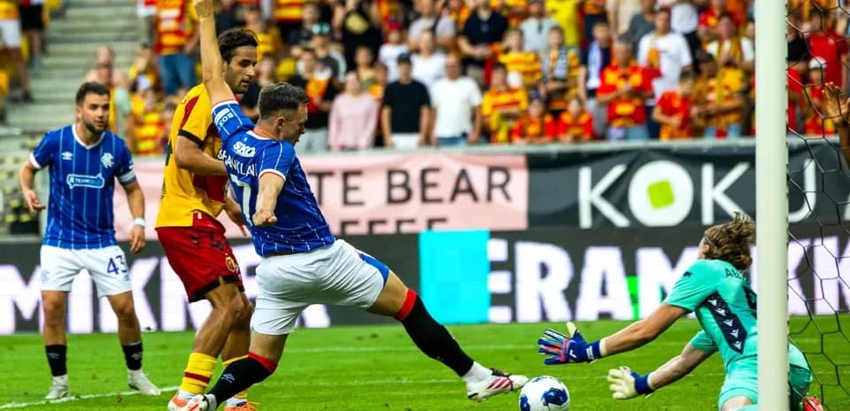 Rangers player attempting a shot on goal