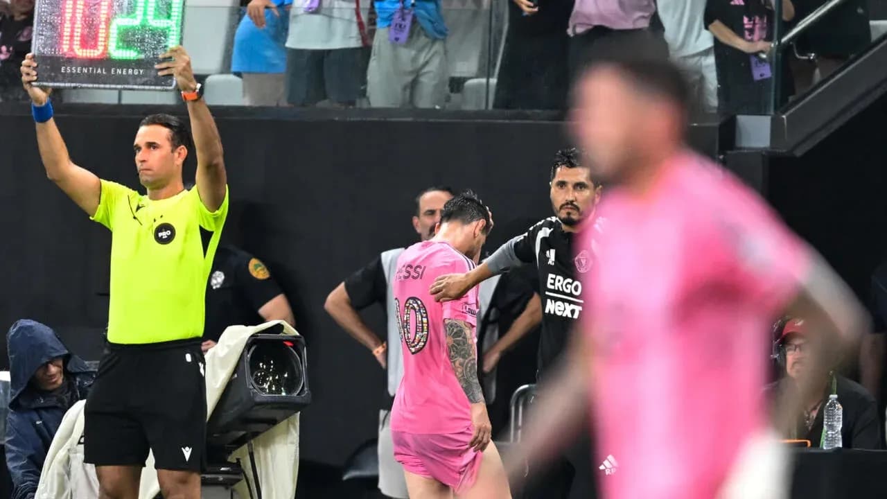 Substitution being made with Messi leaving the field