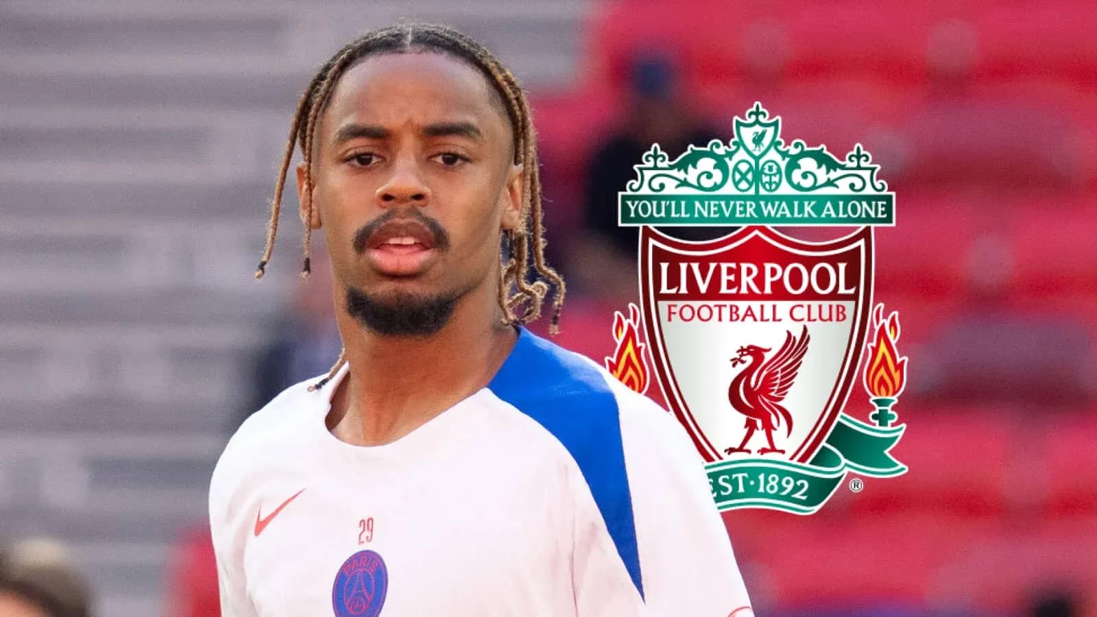 Player in training gear with Liverpool logo backdrop