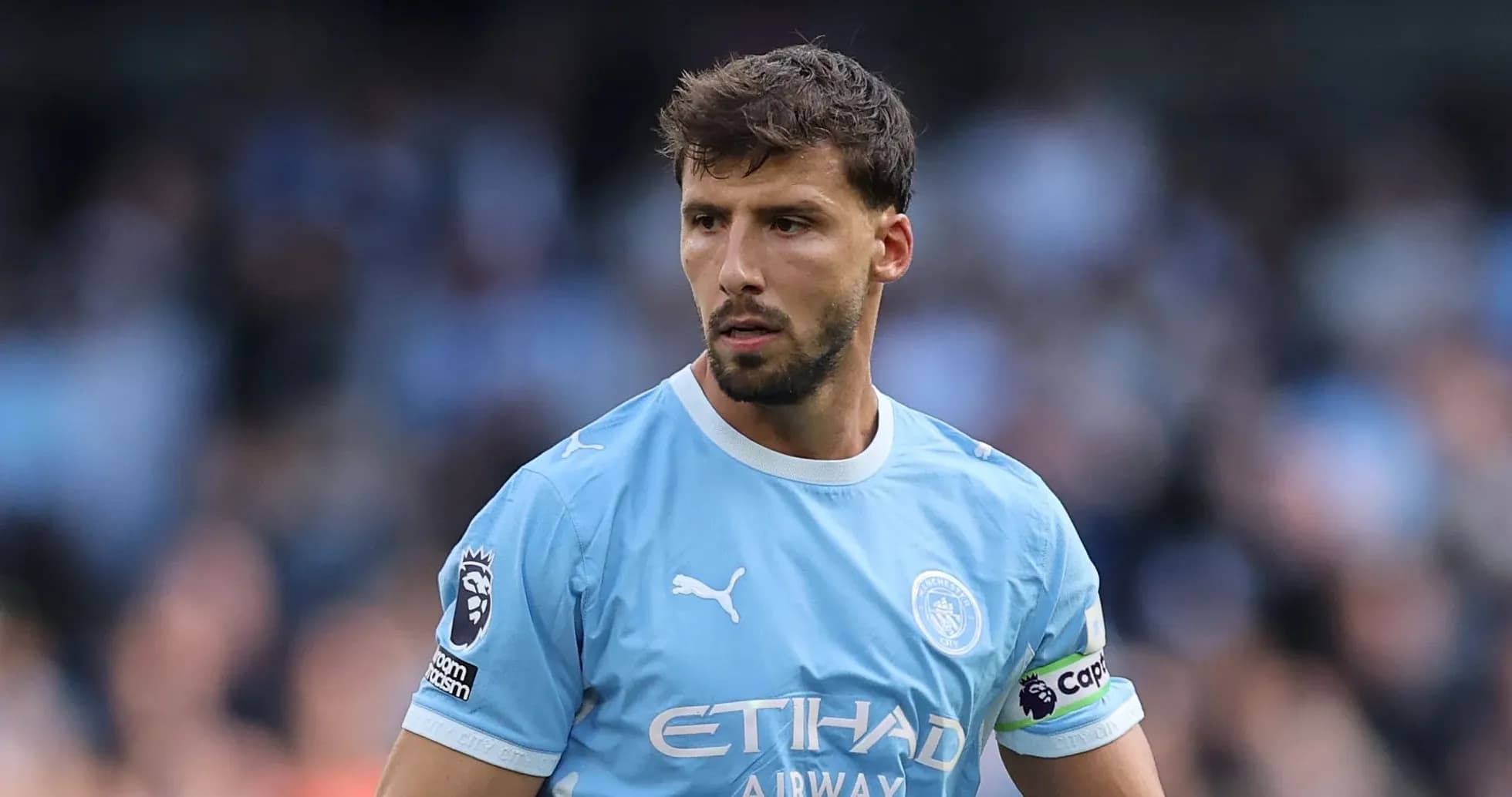 Player wearing Manchester City kit during match