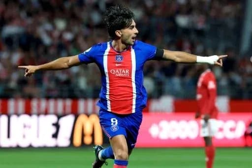 Player celebrating goal in PSG match