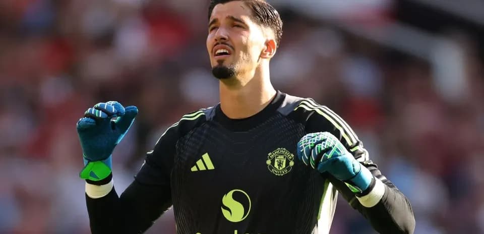 Goalkeeper in Manchester United kit during match