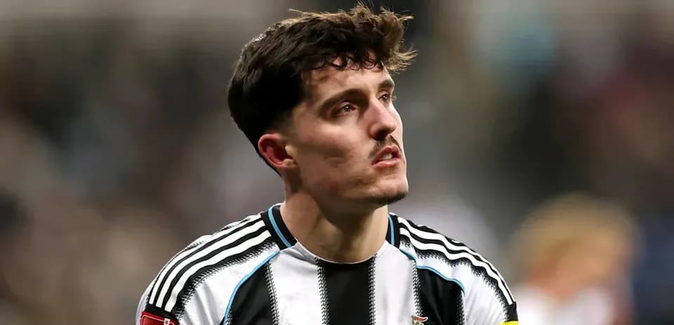 Newcastle player looking up during match