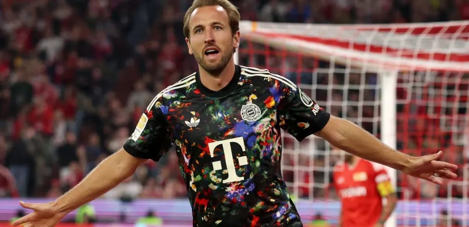 Player celebrating goal in colorful jersey