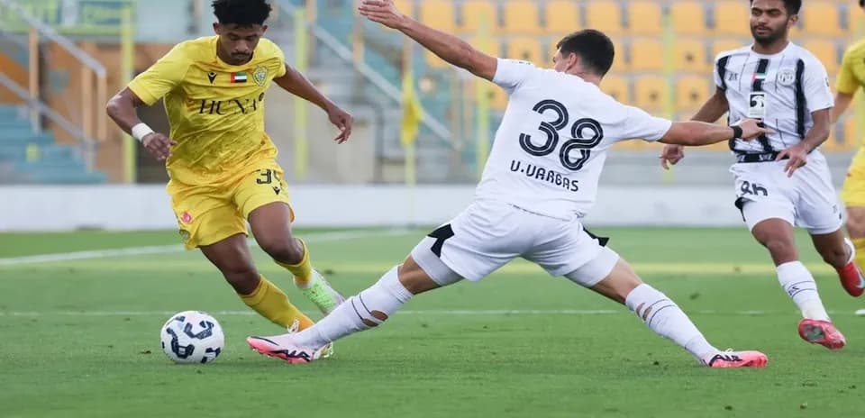 Player dribbling during Al Wasl U23 match
