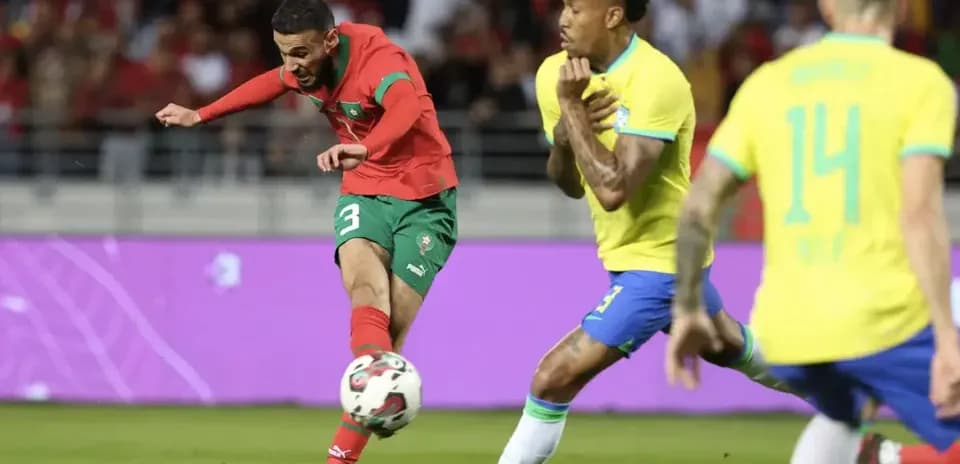 Moroccan player shooting against Brazil