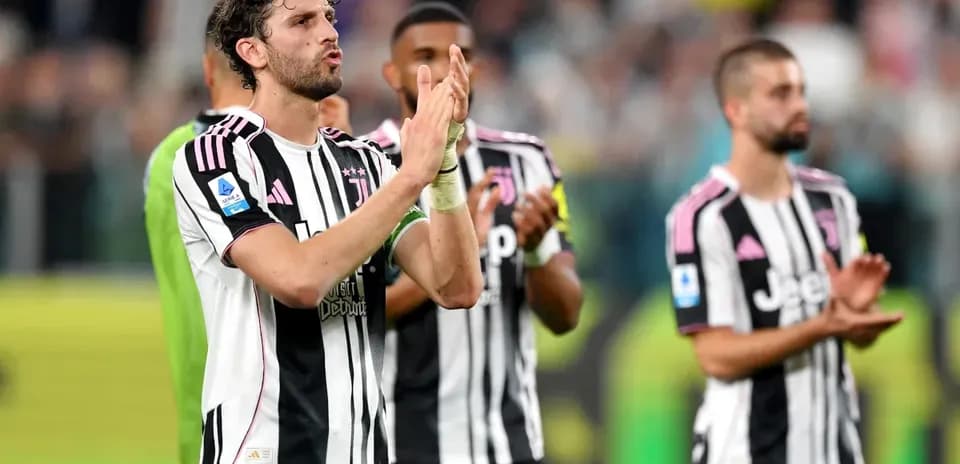 Juventus players applauding fans after a match