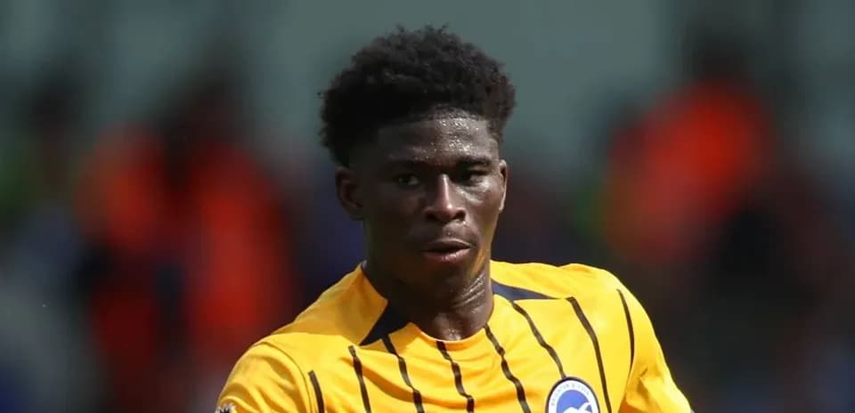 Player in yellow jersey during football match