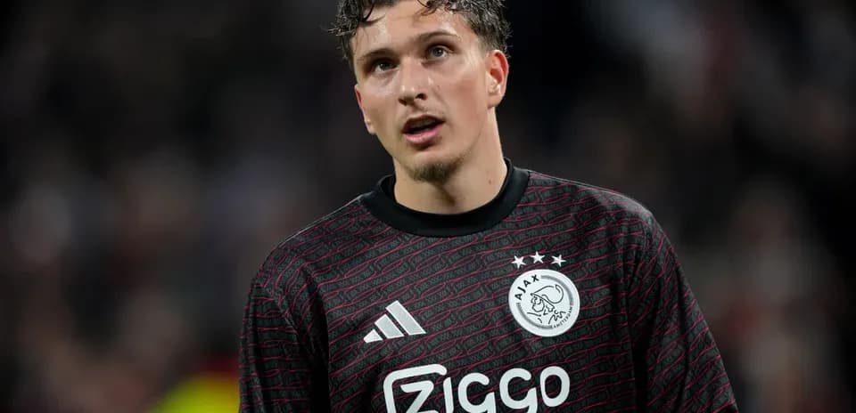 Goalkeeper in Ajax jersey during match