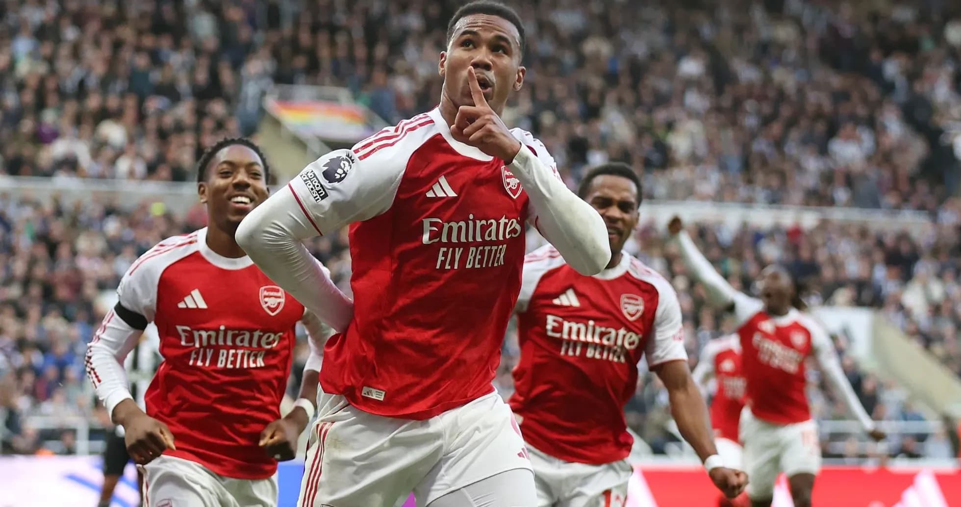 Arsenal players celebrating a goal in the match