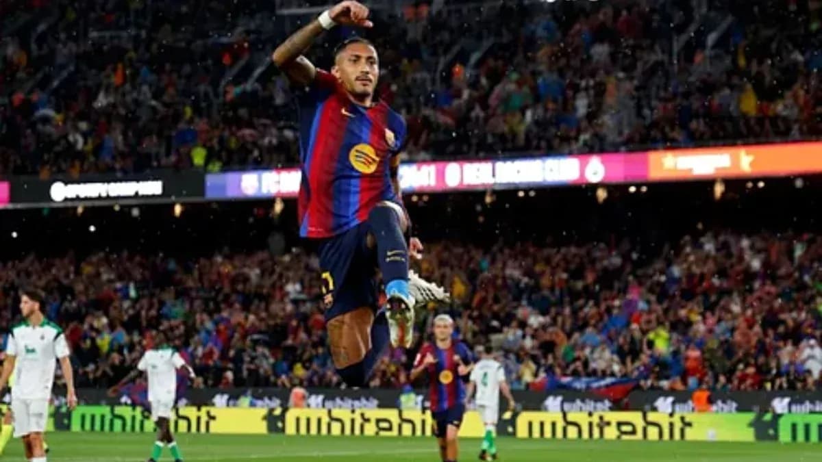 Player celebrating after scoring a goal during match