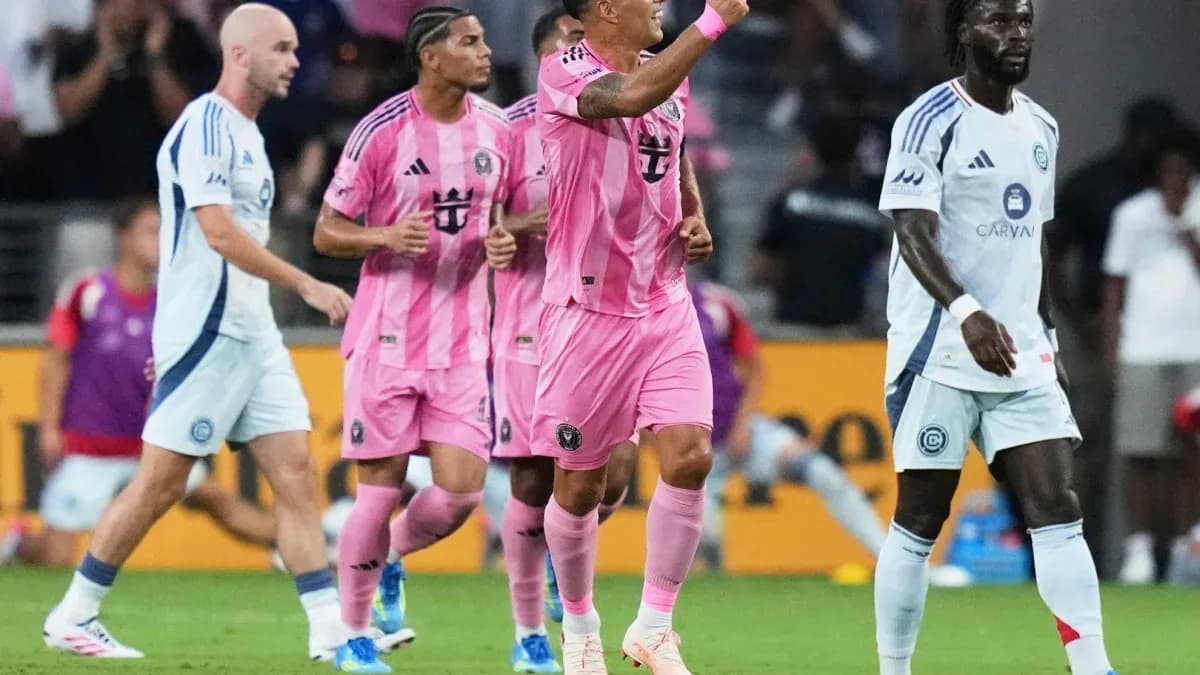 Players celebrating a goal during a match