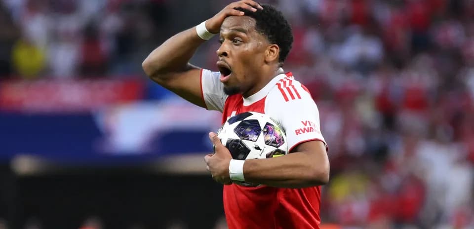 Player holding ball with shocked expression during match