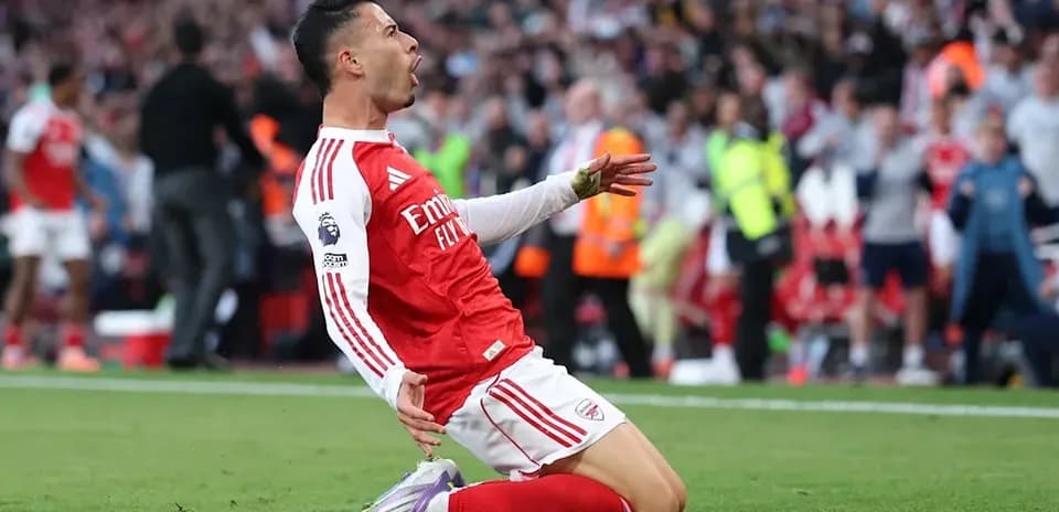 Player celebrating after scoring a goal for Arsenal