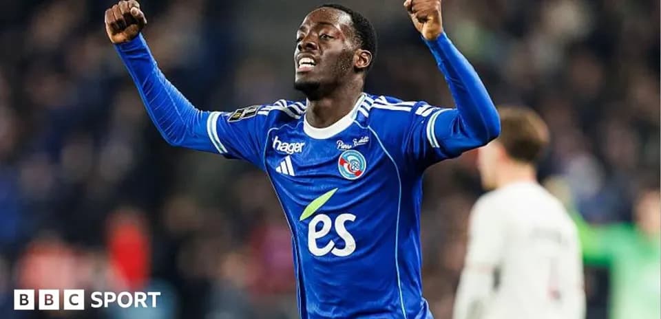 Player celebrating in blue jersey after scoring
