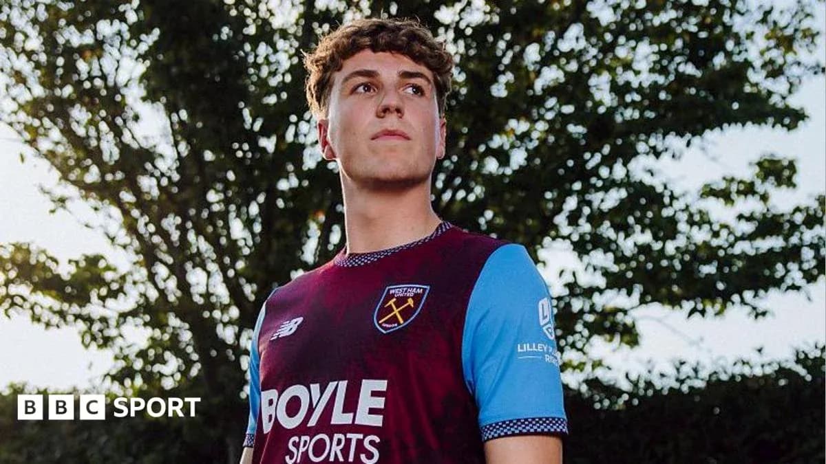 Player wearing West Ham United jersey outdoors