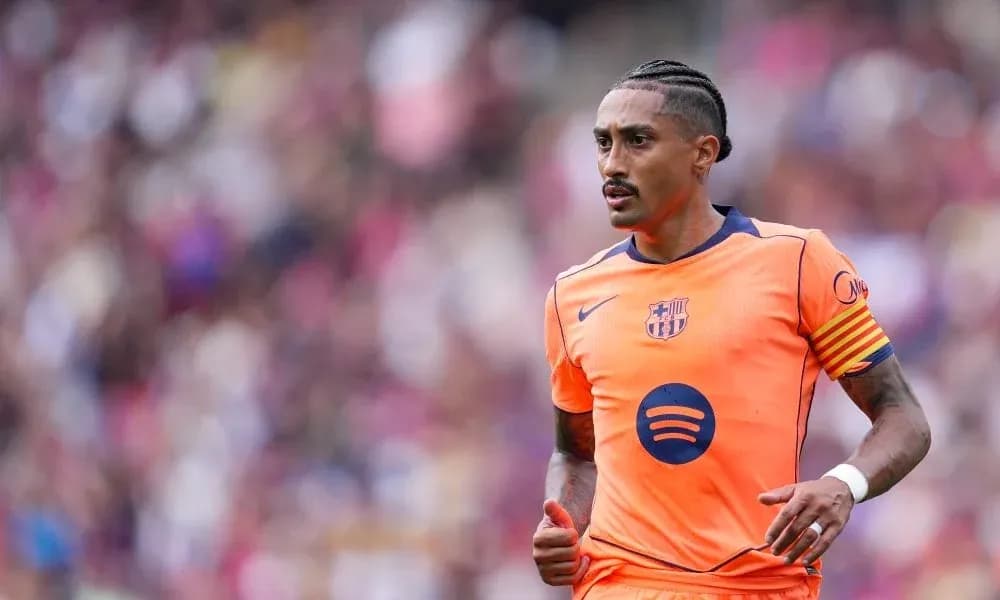 Player in orange Barcelona kit during match