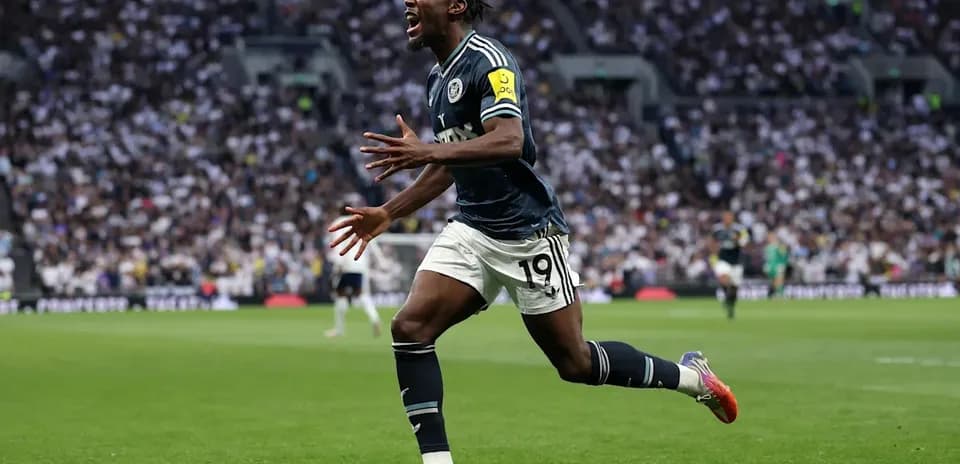 Player celebrating after scoring a goal on field