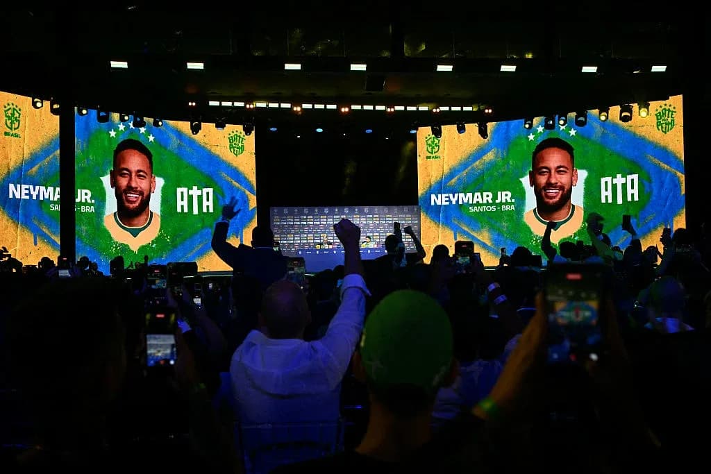 Crowd at event with Neymar Jr. displayed on screens