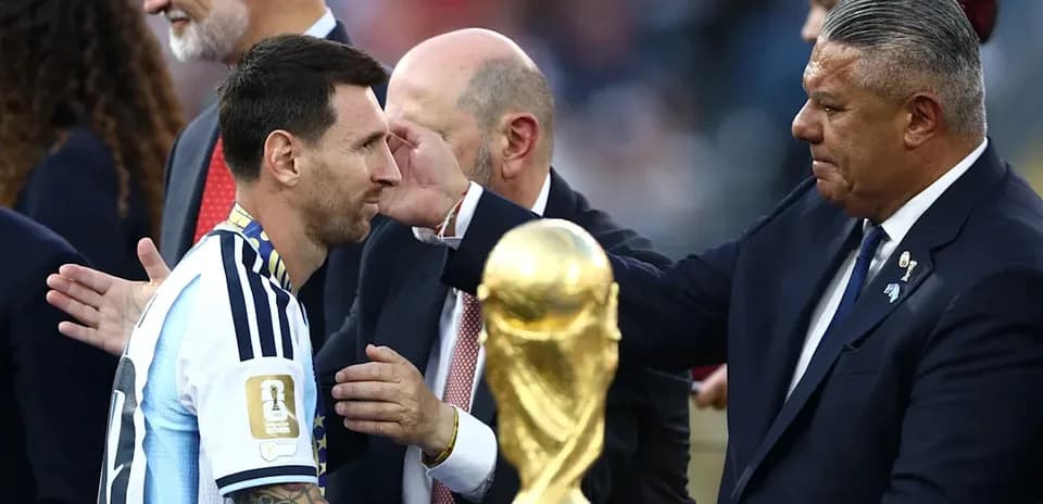 Lionel Messi receiving trophy during awards ceremony