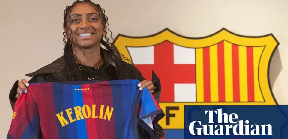 Player holding FC Barcelona jersey at announcement event