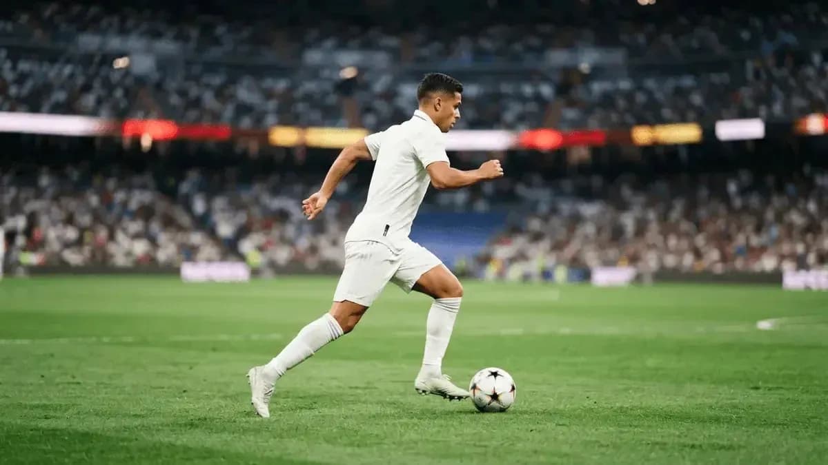 Player running with ball during football match