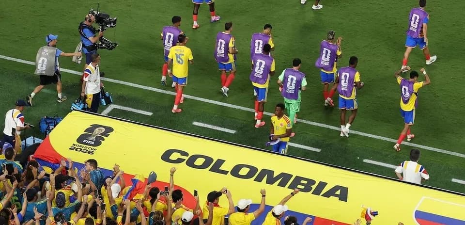 Colombian team celebrating with fans during match
