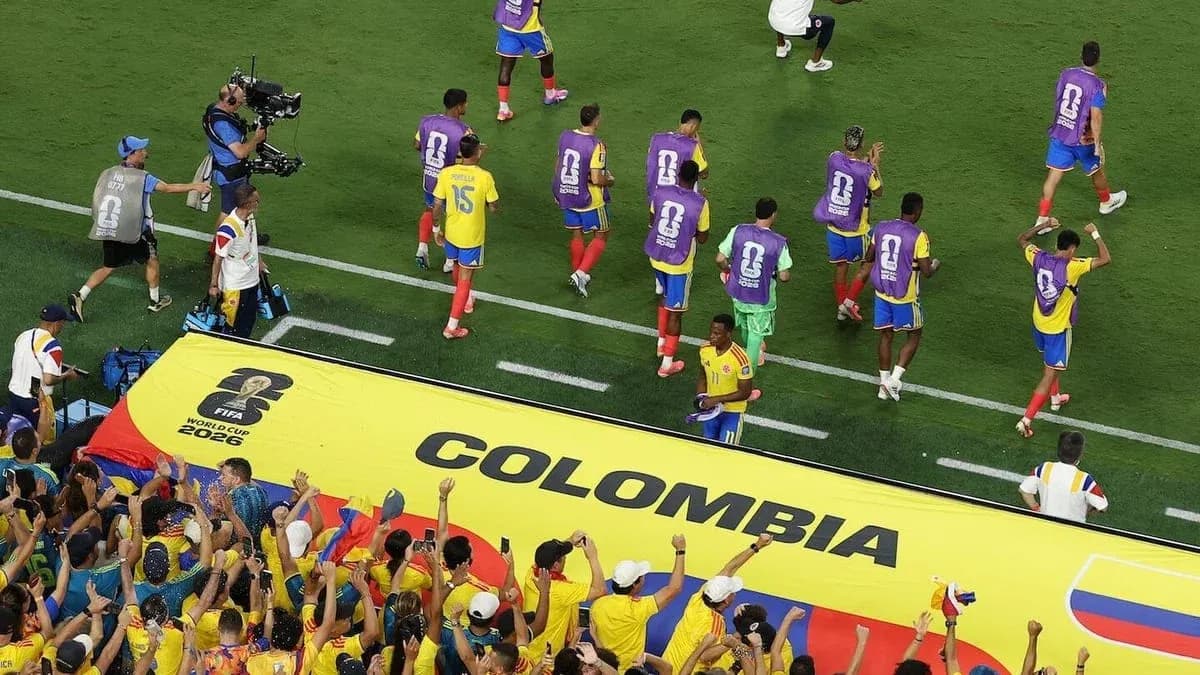 Colombian team celebrating with fans during match