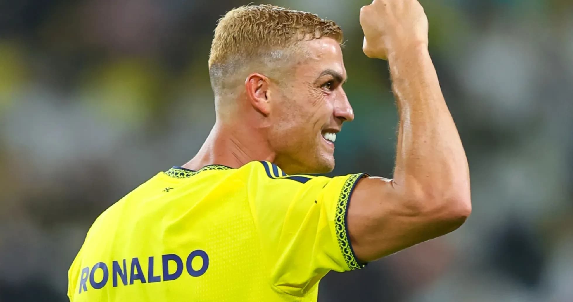 Player celebrating a goal with raised fist