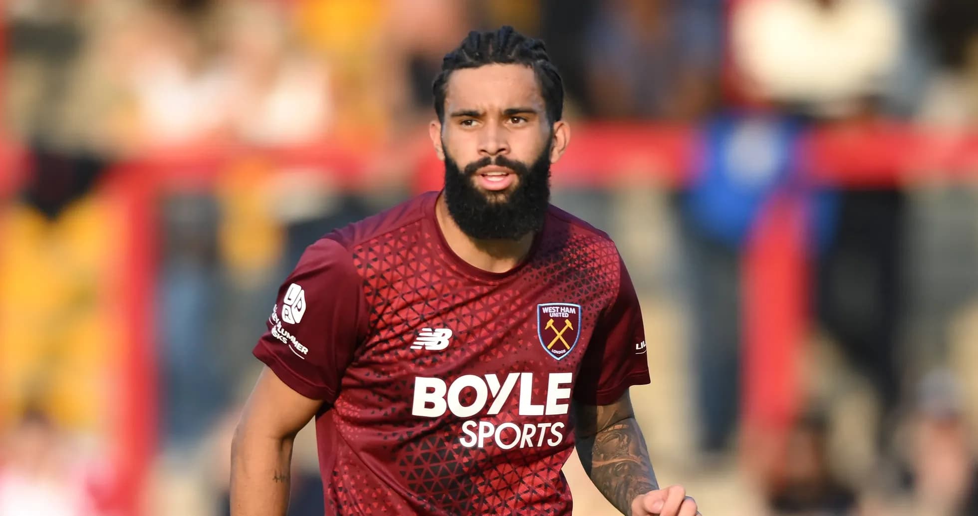Player in West Ham United kit during match