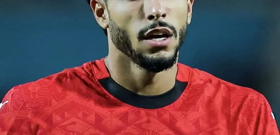 Football player in Egypt national team jersey