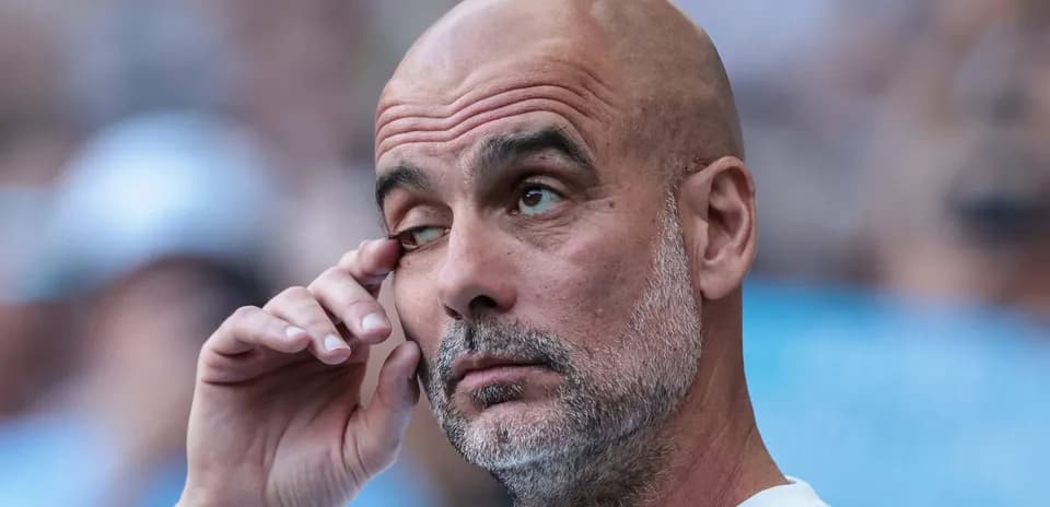 Coach wiping his eye during a match